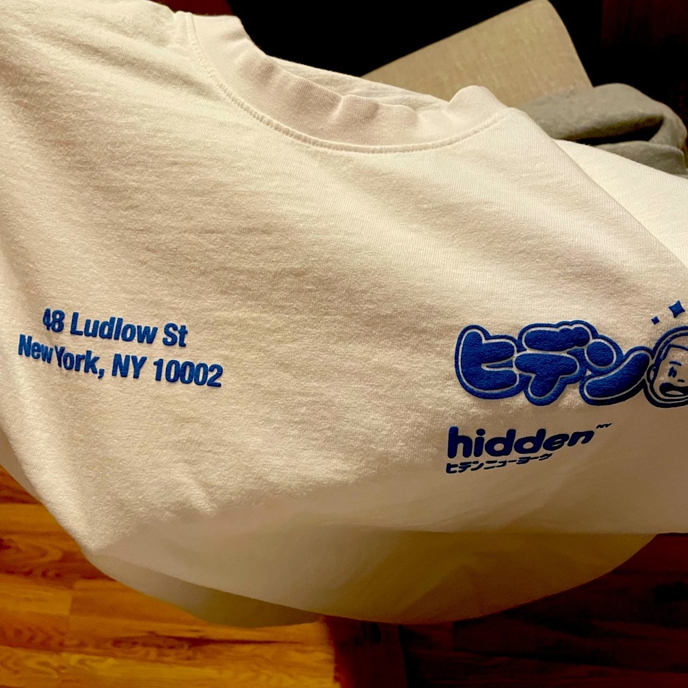 Hidden Coffee Tshirt L NWT and stickers. $110